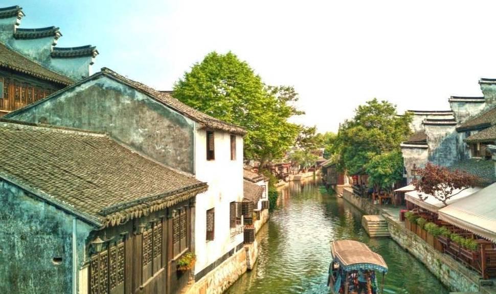 永寿县工商联特邀中国福字展组委会成员在执委企业老盛茶庄挥春送福活动